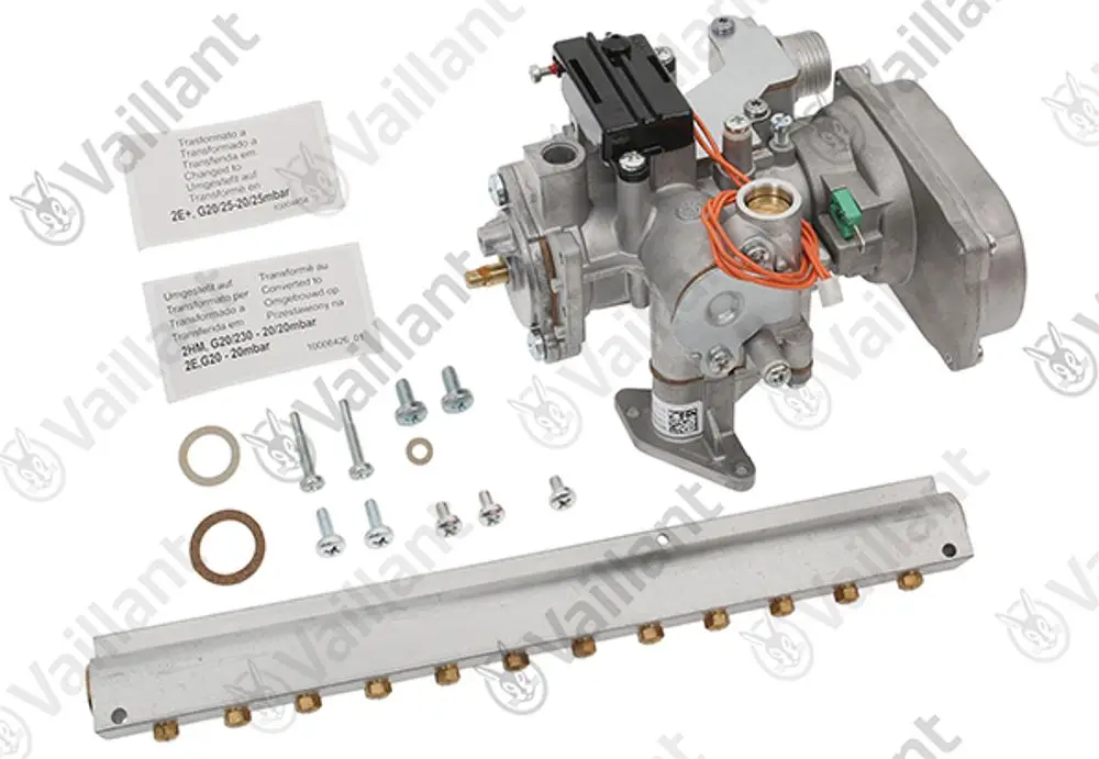 Vaillant Umstellsatz mit verschiedenen Komponenten, darunter ein Gasventil und Metallteile, zur Verwendung in Heizungsanlagen. Zubehörteile sind ebenfalls enthalten.
